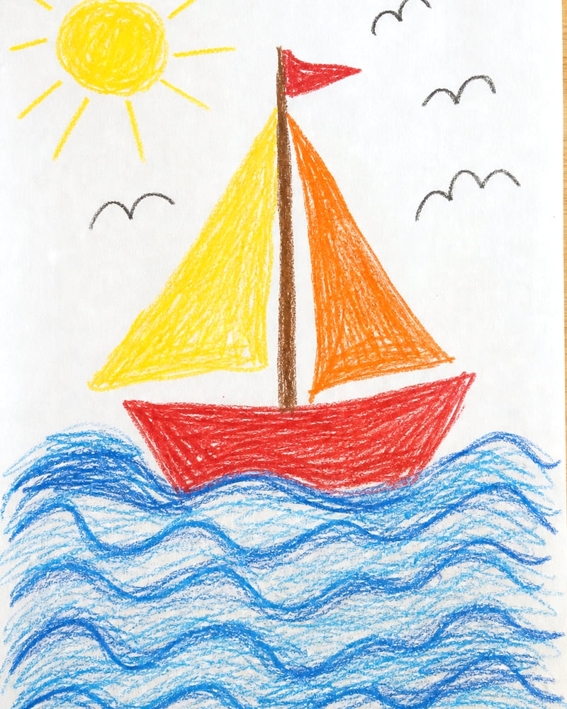A sample drawing after lighting correction: a house with a red roof in crayon.